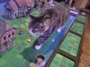 A Game Theory Tables Origins Lit game table with a playful cat walking across a green-tiled board