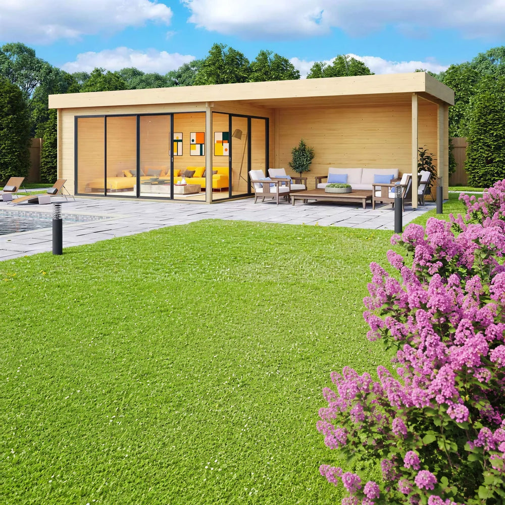 A spacious and modern GardenHouse24 USA ALU Concept 70A AB Garden Room features glass walls and an open lounge area beside a pool in a green backyard