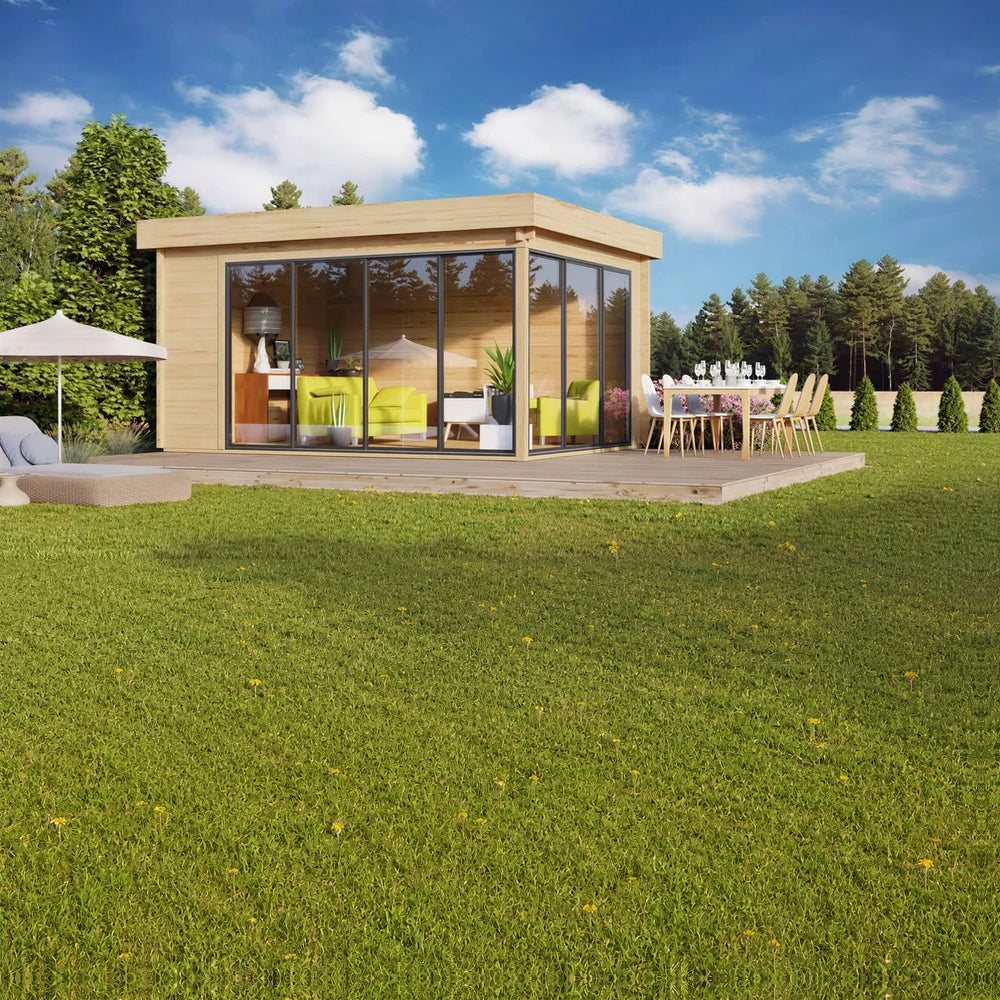 A stylish wooden structure with floor-to-ceiling glass walls stands on a sunny lawn with a dining table outside—this is the GardenHouse24 USA ALU Concept 70A Garden Room