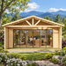 Straight-on view of the ALU Concept Arosa 44C Freedom Office in western North Carolina, surrounded by rhododendrons, native woodland and layered Blue Ridge Mountains, with a professional working inside the glass-fronted office.