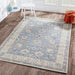 A bright room with wooden floors is beautifully accented by Momeni Anatolia Indoor Rug - ANA-8 Blue