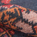 A close-up of Momeni Afshar Indoor Rug - AFS16 Red reveals its soft woven texture and fine detailing in vibrant contrasting hues