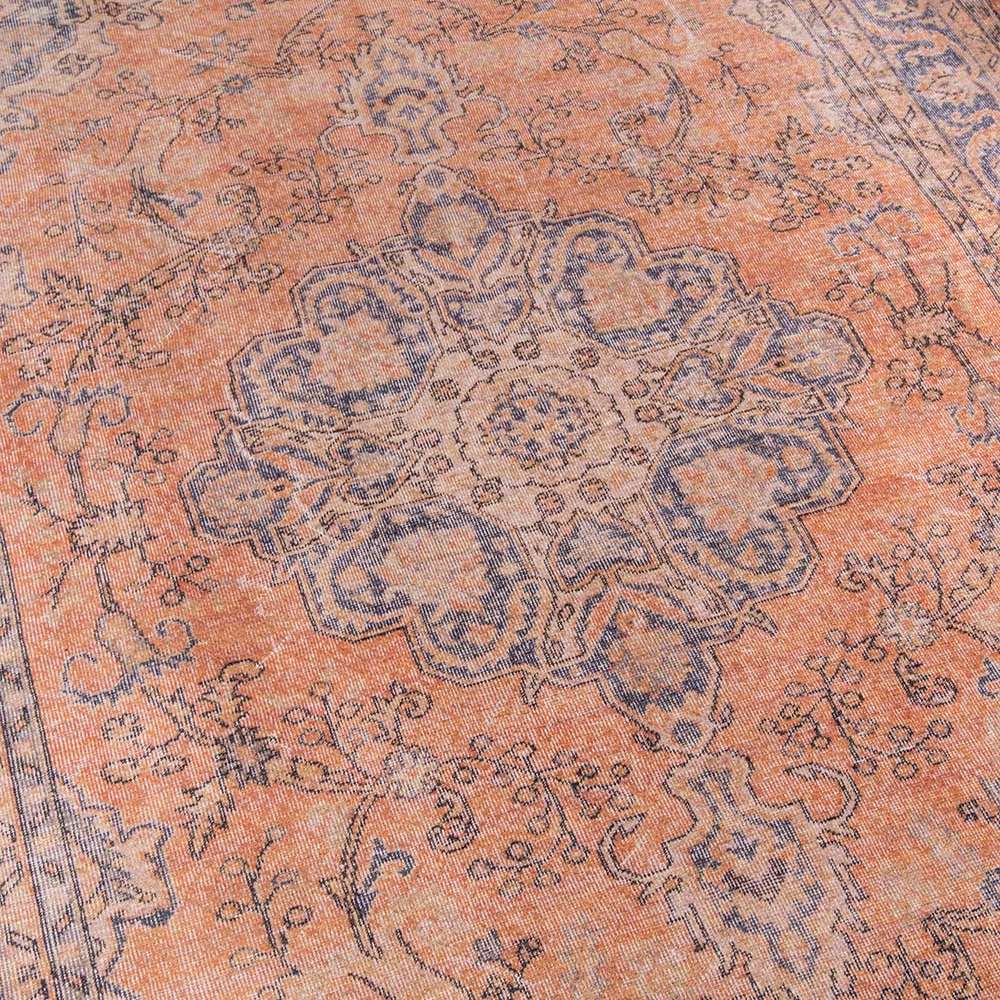 A closer look at Momeni Afshar Indoor Rug - AFS11 Copper reveals the ornate floral medallion and distressed copper background