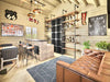 A cozy bar-style interior with leather seating, sports decor, and a modern liquor display is featured in this Sawmill Structures BlueWater Bungalow 160 Garden Room