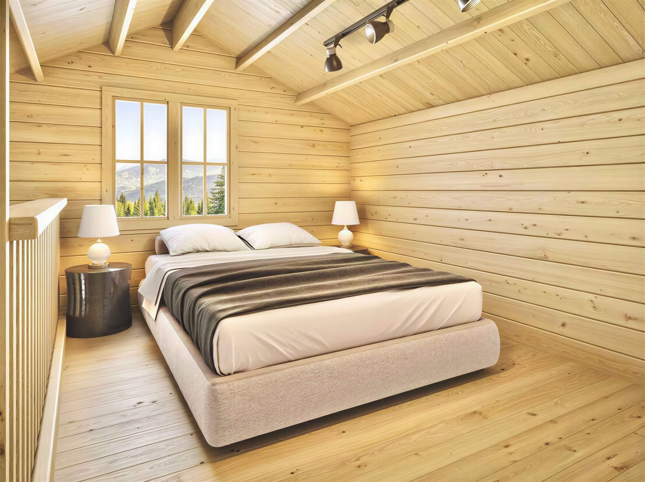 A cozy loft bedroom inside the Sawmill Structures BlueWater Loft 160 70mm Garden Room features a double bed under a sloped ceiling with natural wood walls and mountain views