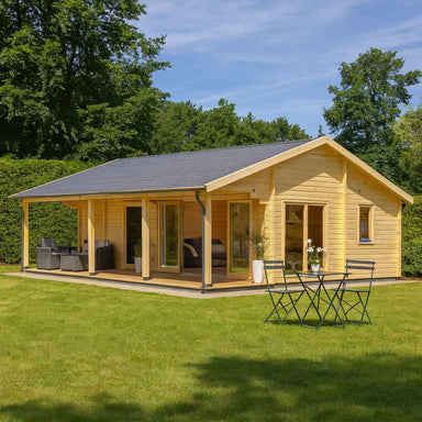 A cozy, modern wooden cabin with a shaded front porch and glass doors nestled in a grassy yard, known as the GardenHouse24 USA Mikka 70B Garden Room