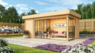 A cozy, sunlit backyard retreat with glass walls and a sofa inside, the GardenHouse24 USA ALU Concept 70C Garden Room blends comfort and nature seamlessly