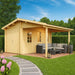 A cozy wooden GardenHouse24 USA Garage Bjarne 44 Garden Room with a spacious covered patio, modern gray outdoor furniture, and a brick base