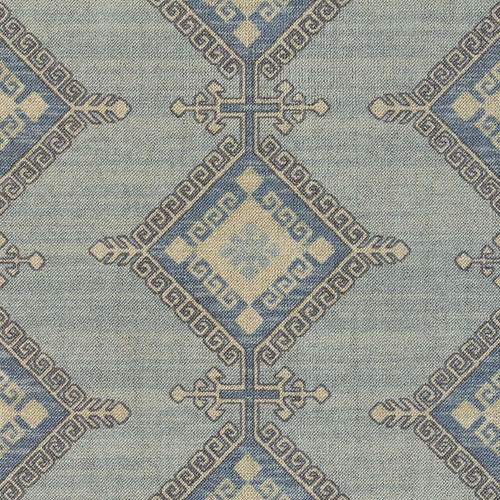 A detailed section of the Momeni Anatolia Indoor Rug - ANA-10 Blue reveals its diamond-shaped motifs with decorative Greek key accents