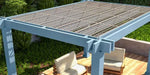 A detailed view captures the structural beams and joint assembly of the Structureworks Reverie Fiberglass Pergola