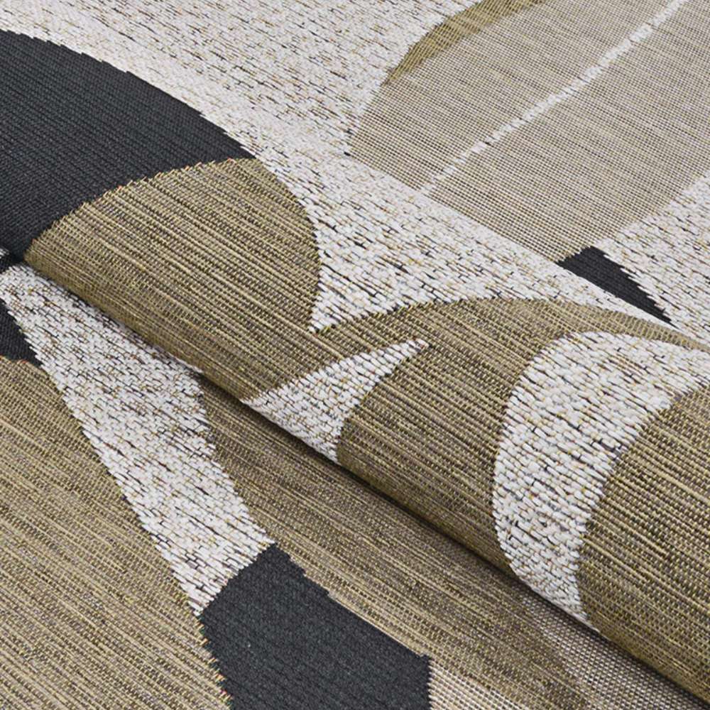 A detailed view shows Couristan Dolce Indoor/Outdoor Rug - Aralia/Naturals-Cool Onyx being partially rolled