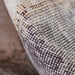 A fabric close-up of Momeni Afshar Indoor Rug - AFS35 Denim shows its finely woven texture for a soft yet sturdy feel