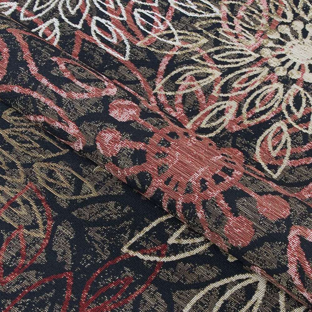 A folded section of Couristan Dolce Indoor/Outdoor Rug - Amalfi/Multi highlights its thick texture and rich red floral designs