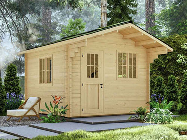 A full exterior view of the Sawmill Structures Harvest Grand Bungalow 107 Garden Room surrounded by greenery and featuring a small porch and lounge chair