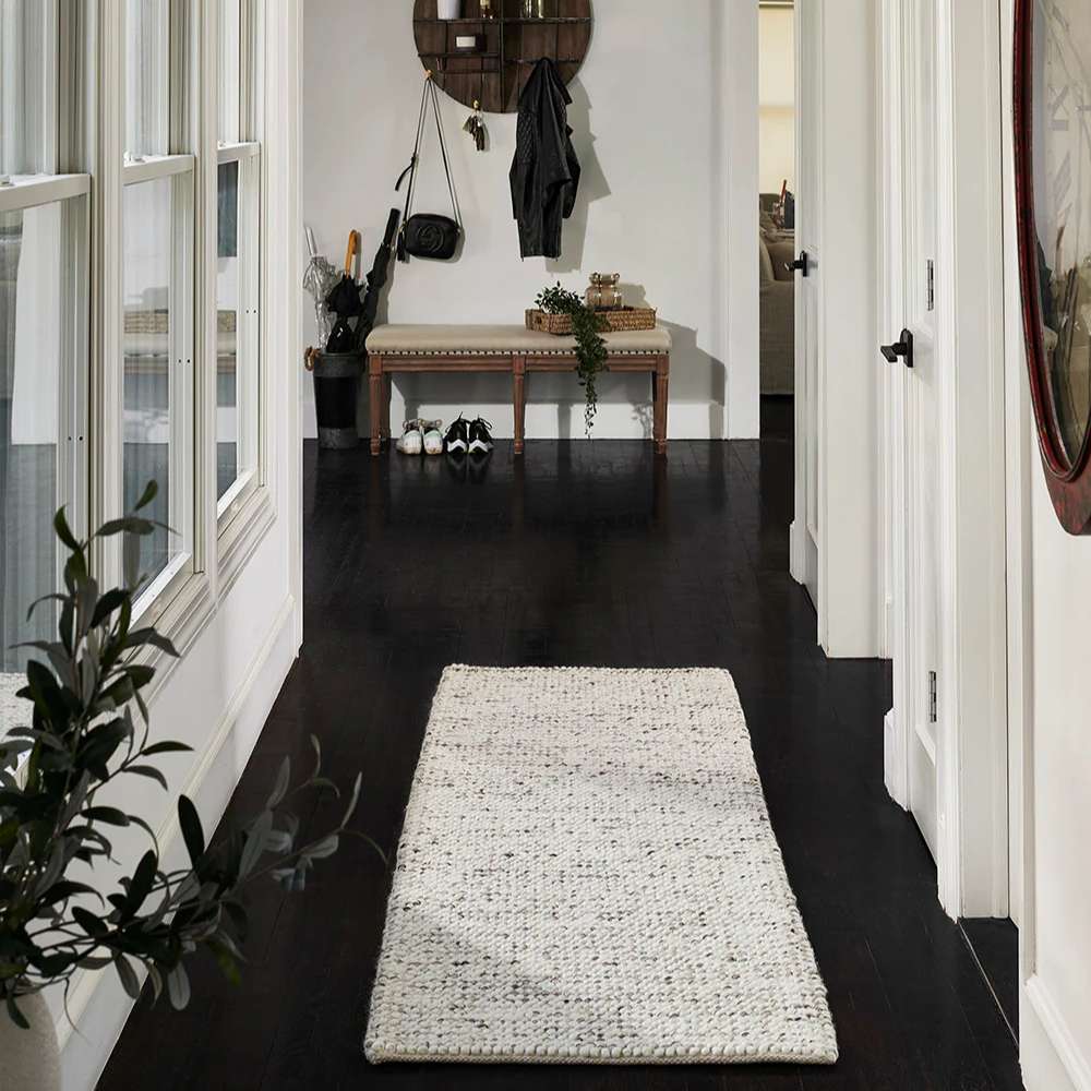 A hallway decorated with Momeni Andes Indoor Rug - AND-8 Ivory