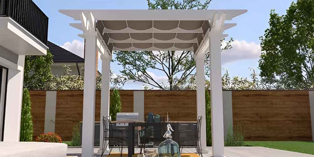 A head-on perspective reveals the Structureworks Marquis Fiberglass Pergola over a patio dining area