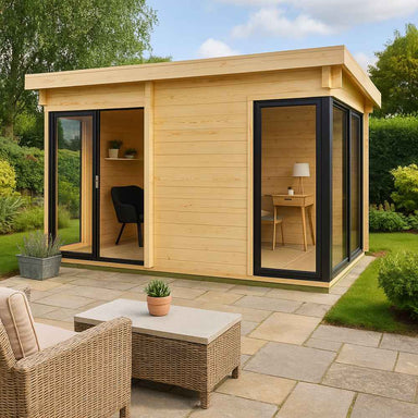 A modern light-wood GardenHouse24 USA ALU Concept 70G Garden Room with black-trimmed glass doors and windows, set on a paved patio surrounded by greenery