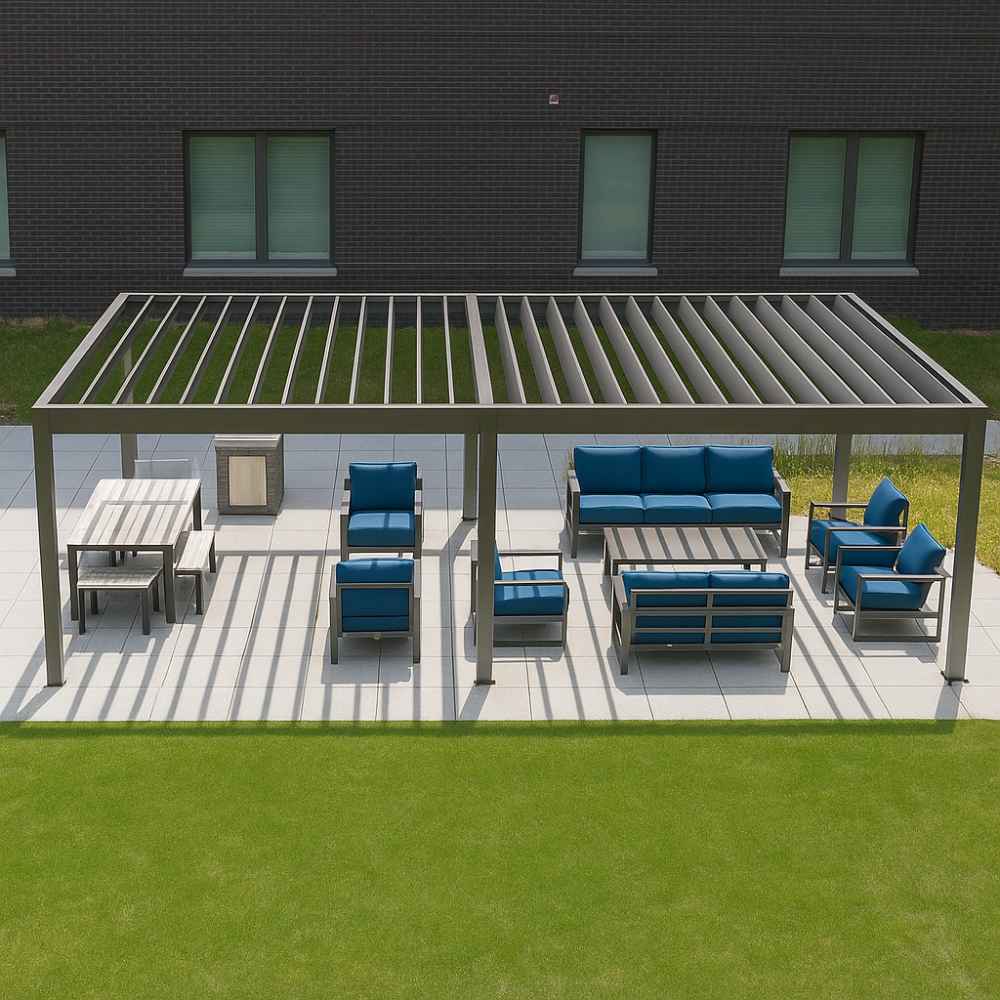A modern patio setup shows a large Structureworks Stratus Aluminum Pergola covering blue-cushioned seating and dining furniture on a tiled surface next to a building