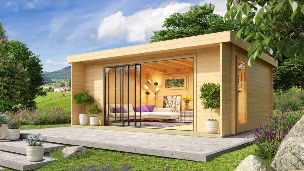 A modern wooden structure with full glass sliding doors and potted plants outside shows the cozy and stylish GardenHouse24 USA ALU Concept 70I Garden Room