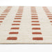 A perspective view highlighting the repeating rows of rust squares across Momeni Archer Indoor Rug - ARC-1 Rust.