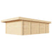 A rear-side view of the GardenHouse24 USA ALU Concept 70Q Garden Room reveals its plain wooden back wall with vertical support beams under a flat roof