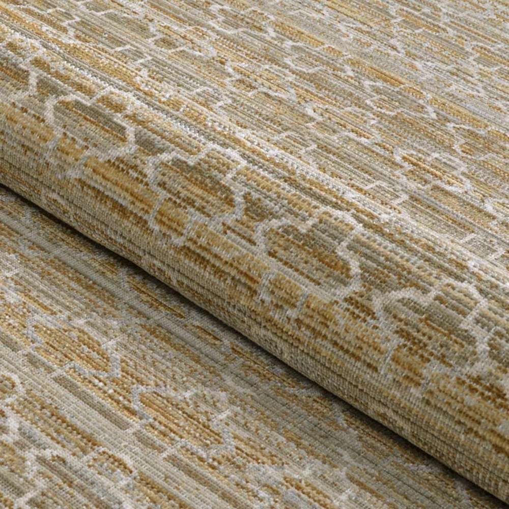 A rolled section of Couristan Fez Indoor/Outdoor Rug - Riad/Sand displays its soft texture and earthy tones