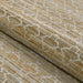 A rolled section of Couristan Fez Indoor/Outdoor Rug - Riad/Sand displays its soft texture and earthy tones