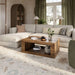 A sectional sofa and wooden coffee table sit beautifully atop Momeni Anatolia Indoor Rug - ANA-5 Beige