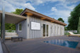 A sleek modern Sawmill Structures The Jasper Garden Suites with a wood deck, plunge pool, and pergola-covered lounge area
