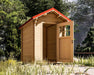 A small wooden shed with a red gabled roof and open door stands surrounded by tall grass and trees, representing the Sawmill Structures The Wee Wee House 33 Garden Room