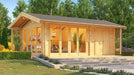 A spacious wooden GardenHouse24 USA Konrad 44 B Garden Room with a pitched roof, large glass doors, and a cozy, plant-filled interior