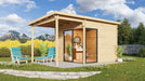 A stylish wooden cabin with a slanted roof and large glass doors stands in a lush garden with mountain views, showcasing the GardenHouse24 USA ALU Concept 70F Garden Room