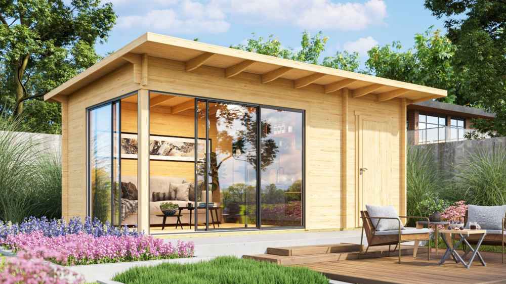 A sunlit corner view of the GardenHouse24 USA Starla 44B ALU Garden Room, featuring a relaxing seating area and wide glass panels