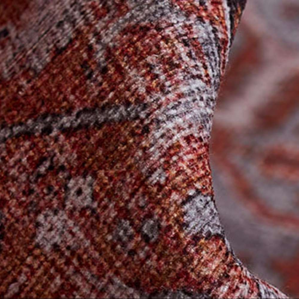 A textured detail of Momeni Afshar Indoor Rug - AFS36 Copper displays its soft, woven fibers and rich blend of copper and gray colors