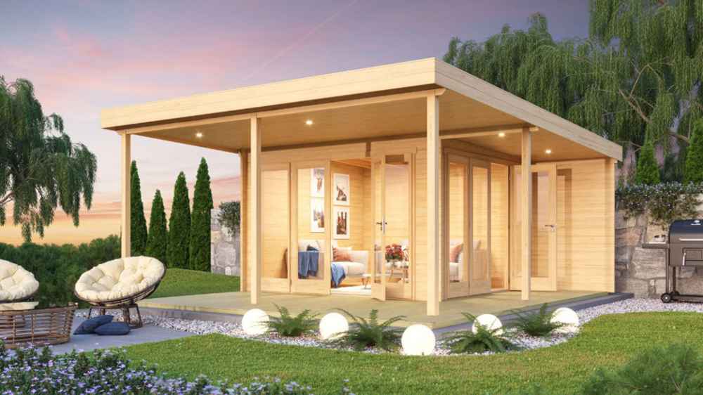 A twilight rendering of the GardenHouse24 USA Keno 70 Garden Room depicts a cozy, lit-up interior surrounded by a beautifully landscaped yard
