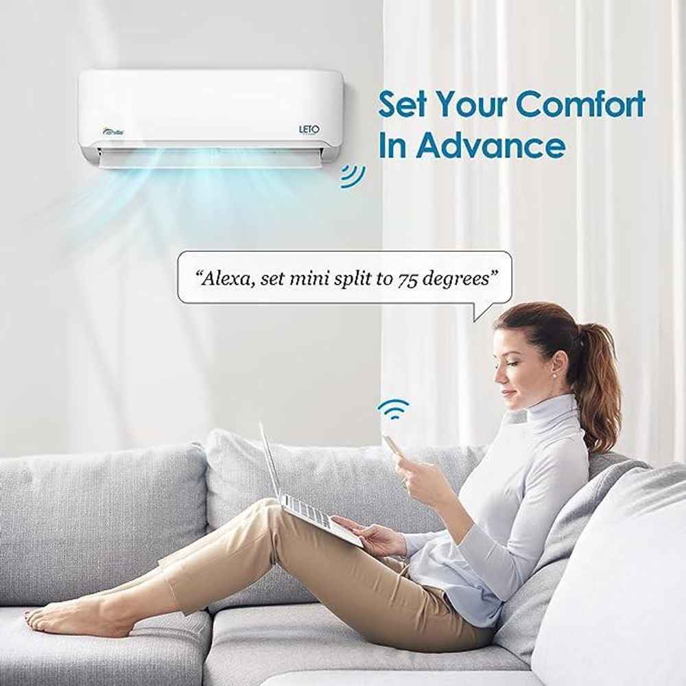 A woman controls the Senville 36000 BTU Mini Split Air Conditioner - Heat Pump - SENL36CD using Alexa voice commands from her phone while relaxing on a couch
