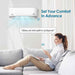 A woman on a couch using Alexa voice control with Senville 9000 BTU Mini Split Air Conditioner - Heat Pump - SENL09CD220V to set the temperature
