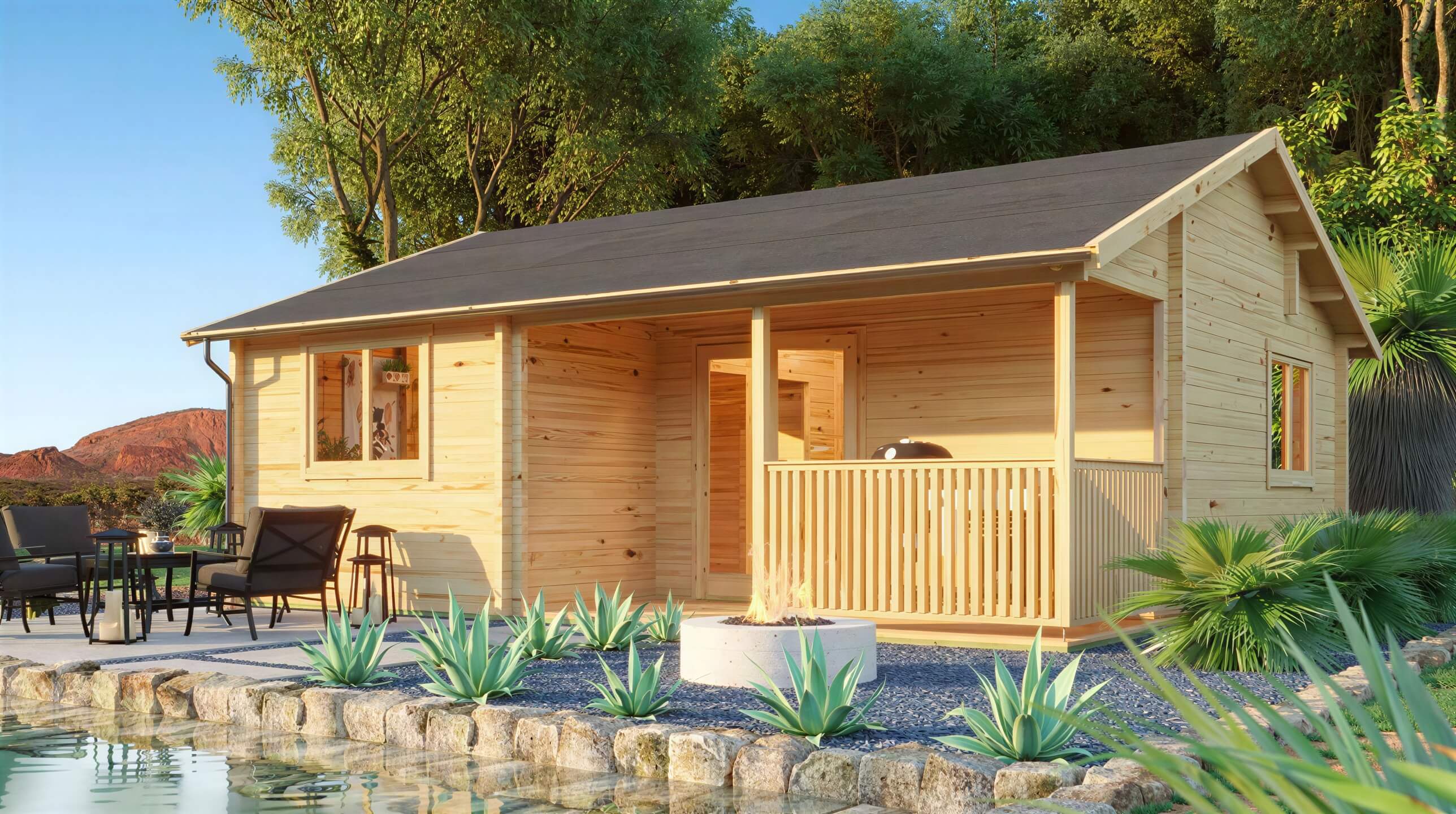 A wooden lakeside cabin with a cozy front porch and patio furniture surrounded by lush greenery is the Sawmill Structures The Sunbeam Lakehouse 70mm Garden Room