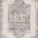 A zoomed-in center detail of Momeni Afshar Indoor Rug - AFS35 Denim reveals the intricate medallion pattern with a distressed finish