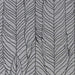 A zoomed-in image of Couristan Dolce Indoor/Outdoor Rug - Majorelle/Silver-Black highlights its fine woven detail and repeated leaf design