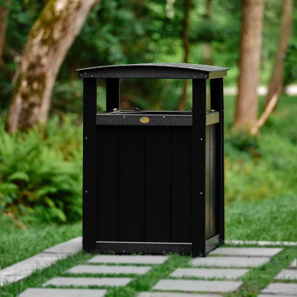 A black poly lumber rectangular outdoor LuxCraft Trash Can with a slightly curved top.