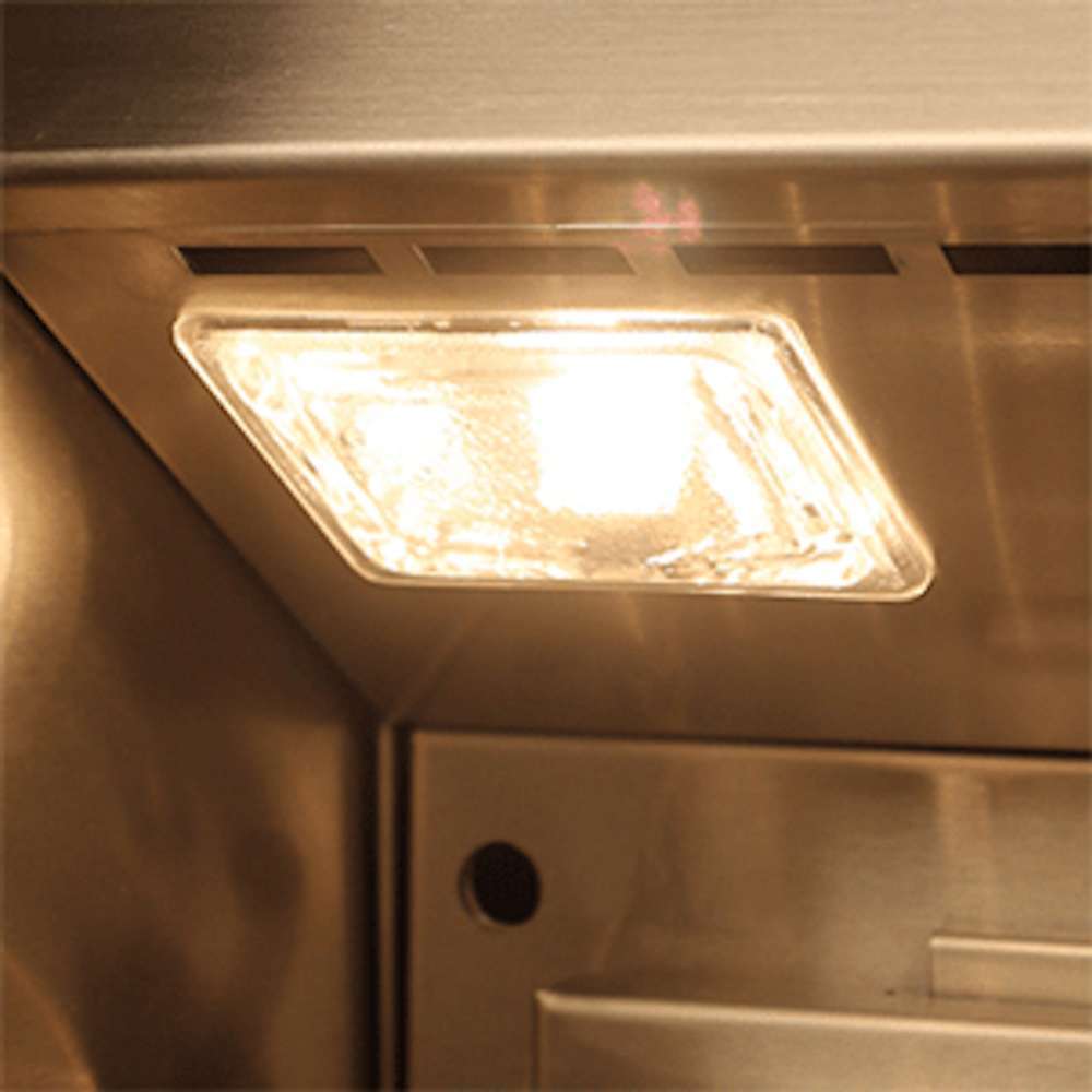 A bright halogen light inside the Alfresco Grills 56″ Luxury All-Grill Built-In