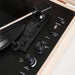 A close-up of controls on Arkrocket Coryphaeus Bluetooth Turntable Deluxe Edition Record Player (Flora Engraved) shows the power switch, line-in options, and record-playing controls
