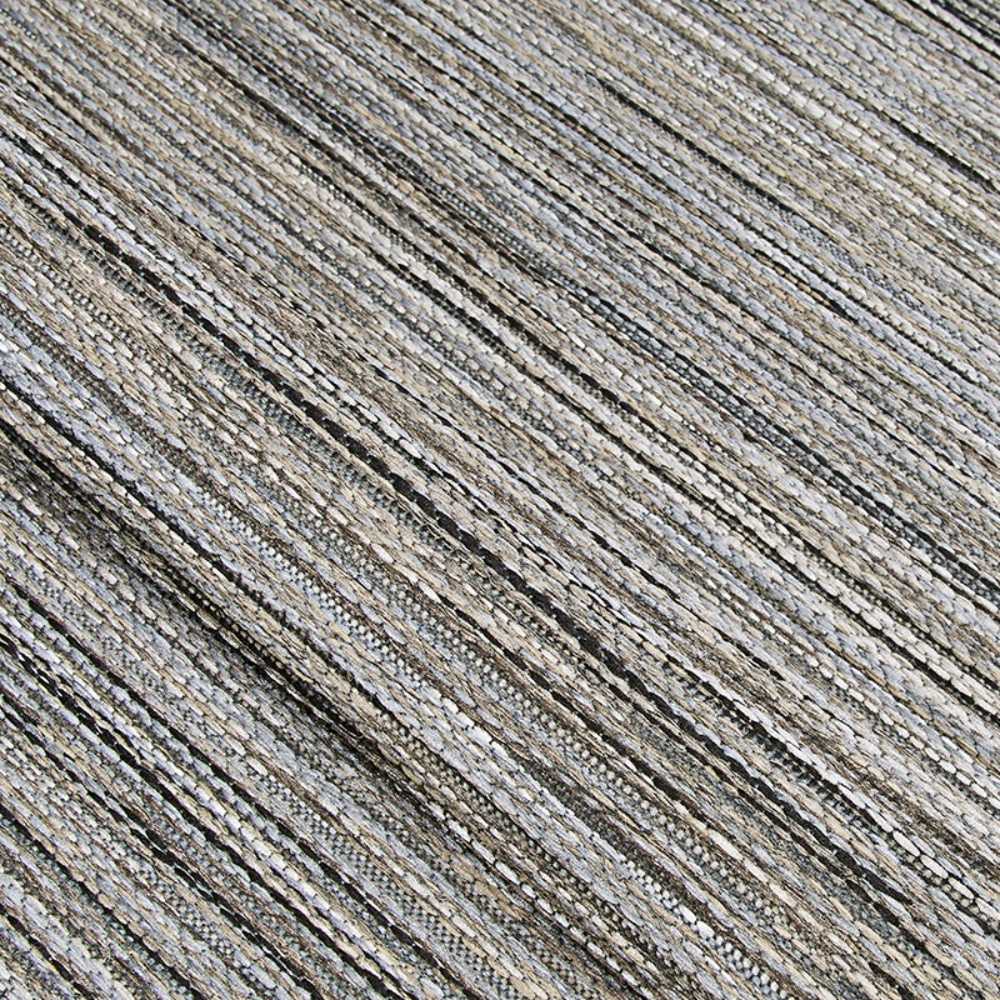 A close-up of the Couristan Cape Indoor/Outdoor Rug - Hinsdale/Light Brown-Silver displays its tightly woven texture and subtle color variation