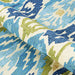 A close-up of the Couristan Covington Indoor/Outdoor Rug - Delfina/Azure-Lemon shows the rug’s durable loop pile construction and vibrant blue and green hues