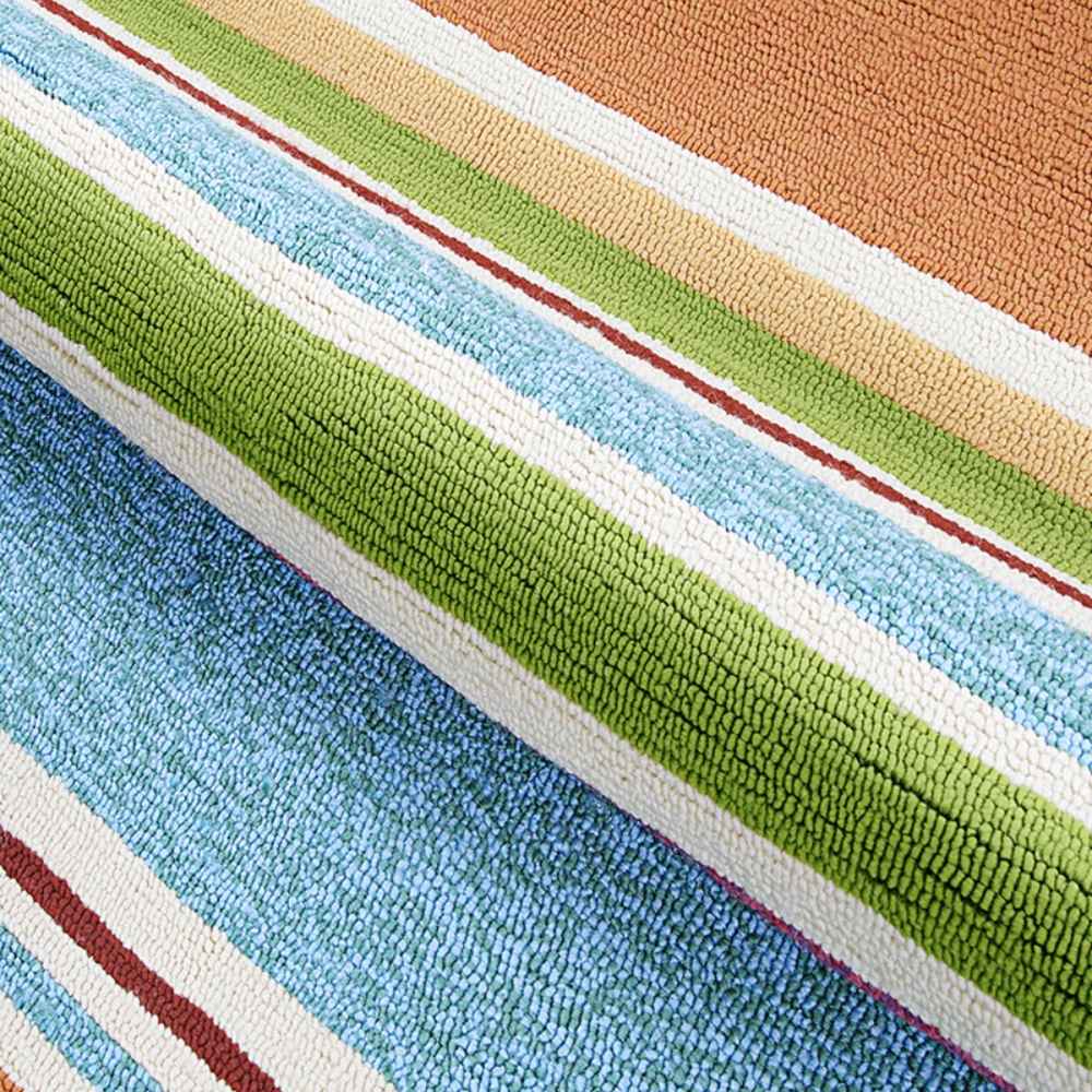 A close-up of the Couristan Covington Indoor/Outdoor Rug - Sherbet Stripe/Multi reveals its looped, textured surface and bright, tightly packed stripes