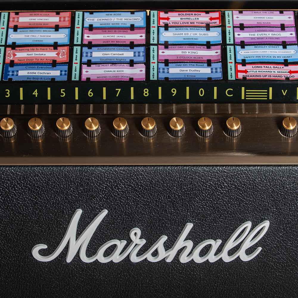 A close-up of the Marshall Rocket Vinyl Jukebox - Black shows a vibrant song selection panel with colorful tracks labeled