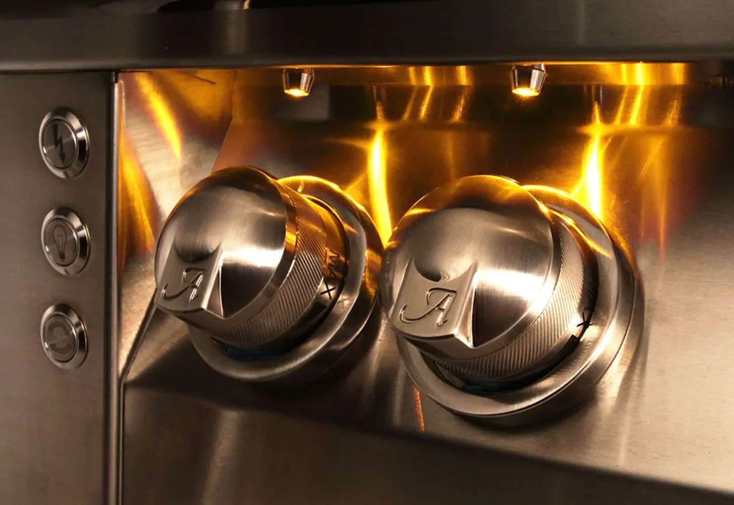 A close-up of the illuminated control knobs on the Alfresco Grills 56″ Luxury All-Grill Built-In