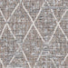 A close-up of the pattern on the Couristan Charm Indoor/Outdoor Rug - Thicket/Twig reveals an interwoven diamond design with mixed tones for added depth