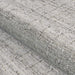 A close-up of the soft, textured weave shows the subtle checkered design of the Couristan Ascot Indoor/Outdoor Rug - Windowpane/Linen